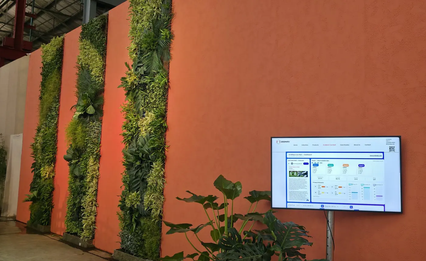 The wall and the live screen outside the auditorium, 13 December 2025