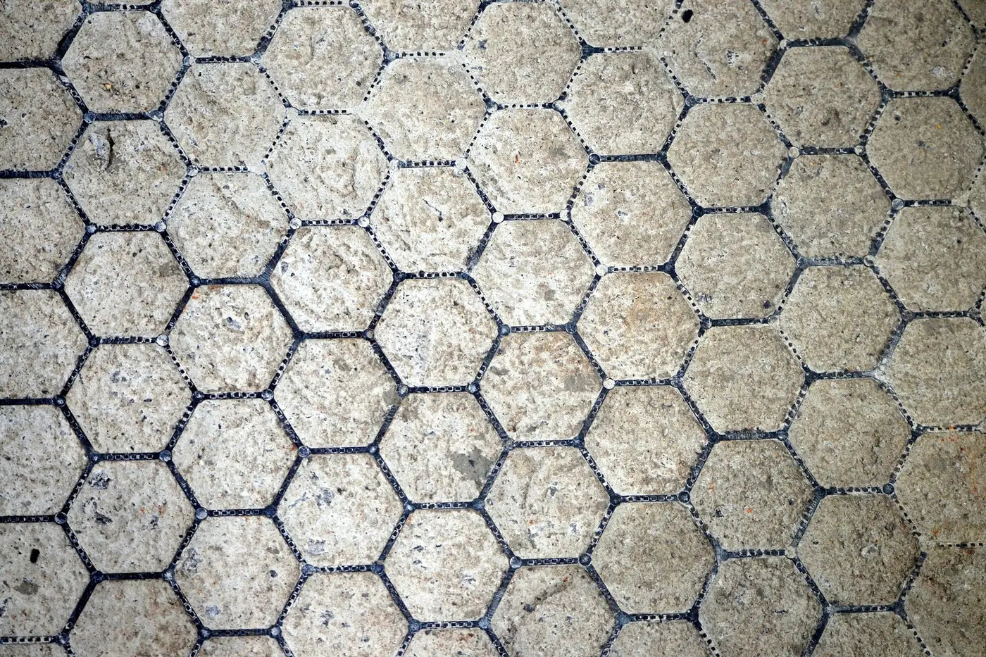 Concrete filled flush to the hexagon cell tops